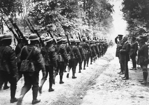 A Canadian battalion marches past Sir Robert Borden, then prime minister of Canada, in France on July 1, 1918. General Arthur Currie, the senior Canadian commander at Vimy Ridge, is on the right.