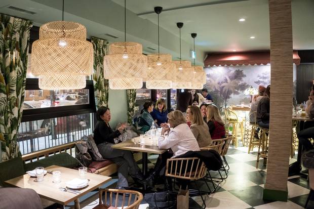 The large, low-hanging wicker lamps provide a nice glow while one’s having dinner.