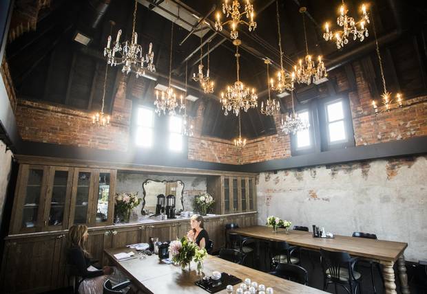 Natasha Deen, left, and Erika Hogerwaard, sit in the private dining room of the Broadview Hotel on Wednesday.