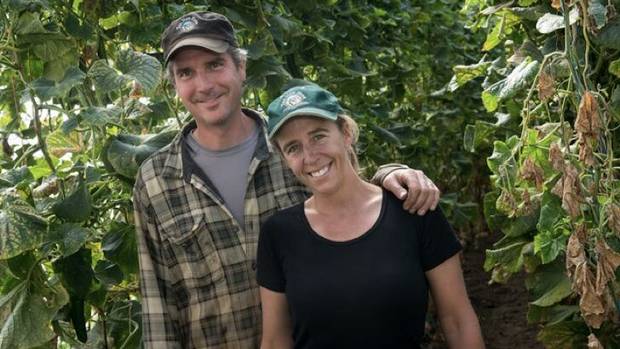 Brent Preston and his wife Gillian Flies on their farm in Ontario