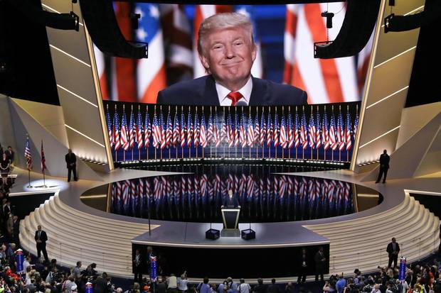 Republican presidential candidate Donald Trump smiles as he addresses delegates on Thursday.