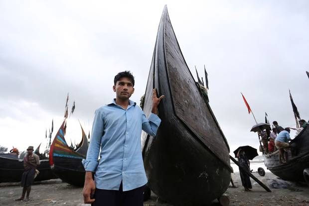 Muhammad Selim tells The Globe and Mail he and his fellow passengers were given just two bowls of rice a day, forced to sit in such tight quarters they could only fit by interlocking legs and regularly beaten with pipes and strips from rubber tires.