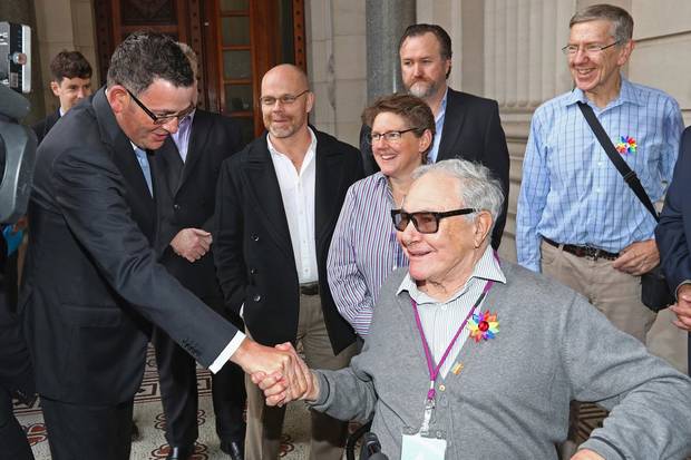 May 24, 2016: Daniel Andrews, Premier of the Australian state of Victoria, shakes hands with Noel Tovey before making an apology to the Victorian gay community at Parliament House in Melbourne.