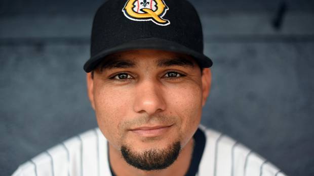 Yuniesky Gurriel is pictured in the Quebec Capitalesdugout before a game against the Garden State Grays. Four Cuban baseball players were legally allowed to leave the country to play baseball in Canada for the Quebec Capitales. This is a new venture for Cuba which is now only beginning to see a thaw in it's relationship with the United States.
