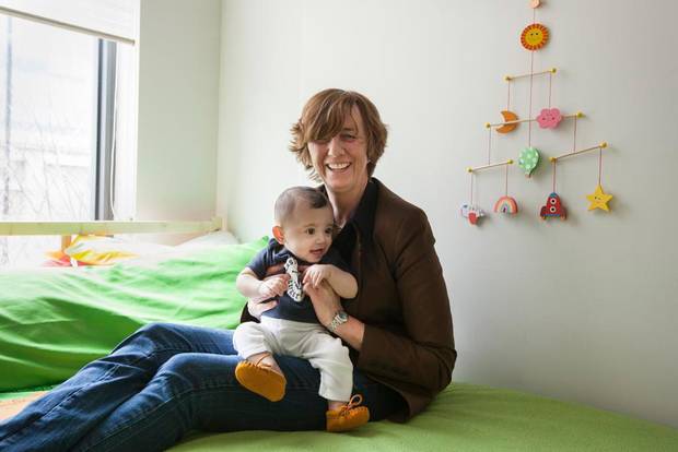 Martine Roy with her baby girl, Cascia Roy-Paul, at home in Montreal. Ms. Roy was forced out of the armed forces when her superiors found out she was gay.