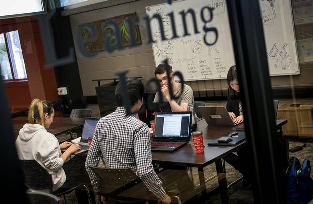 Students share the Library Learning Lab at Wifred Laurie University in Waterloo. 