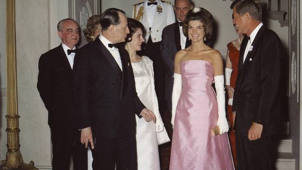John F. Kennedy and Jackie Kennedy attend a dinner in Washington on May 11, 1962.