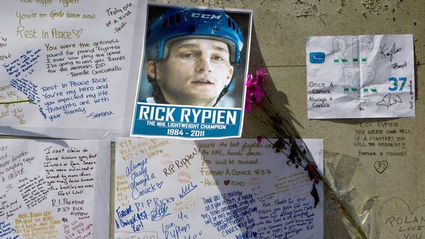 Messages posted to a pillar at Rogers Arena in Vancouver honour the memory of former Vancouver Canuck Rick Rypien in August 2011.