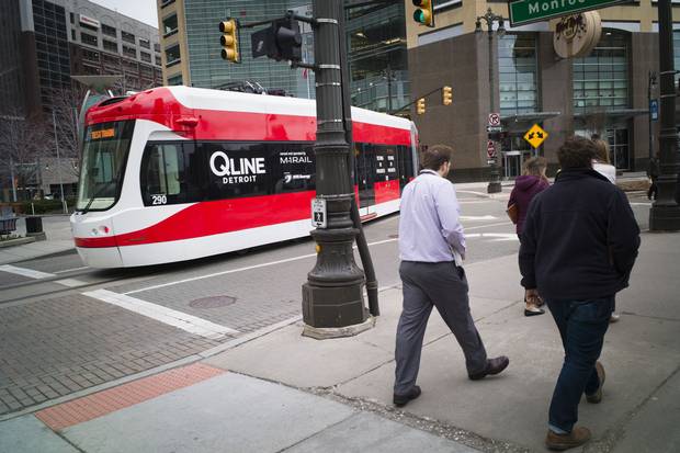 A QLine streetcar runs through downtown Detroit on a test run. Civic officials hope the new line, which opens May 12, will help the city’s economy to bounce back after a devastating bankruptcy.