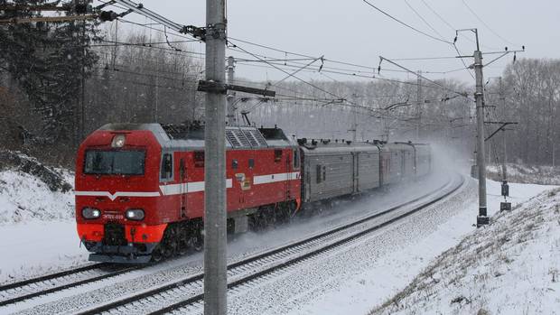 A locomotive travels on the Trans-Siberian railroad in the Kemerovo region of Siberia near Yashkino, Russia, on Friday, Oct. 24, 2014.
