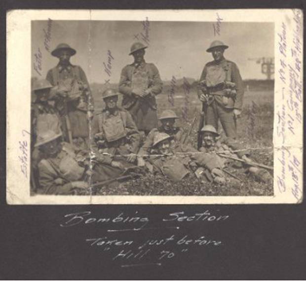 Herbert Blackall, shown lying down, second from left in the first row, is shown with the bombing section of 4 Platoon, #1 Company, 15th Battalion before the Battle of Hill 70 in August, 1917.