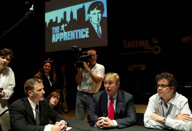 Donald Trump interviews potential contestants for his TV show, The Apprentice, in 2004.
