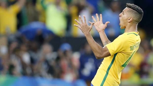 Brazil's Marquinhos celebrates his team's victory over Germany during the final of the men's Olympic football tournament at Maracana stadium in Rio de Janeiro, Brazil, on August 20, 2016.