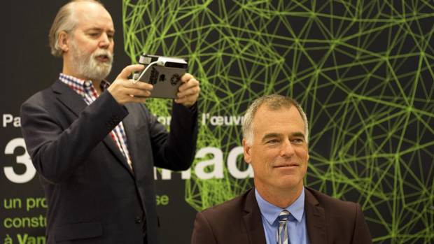 Douglas Coupland scans Peter Simons, and a printer will recreate his image.