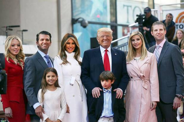 Republican presidential candidate Donald Trump, centre, stands with his wife Melania Trump (centre left) and from right: Eric Trump, Ivanka Trump, Donald Trump Jr. and Tiffany Trump. In the front row are Kai Trump and Donald Trump III, children of Donald Trump Jr. on April 21, 2016 in New York City.