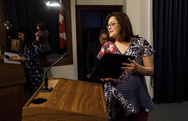 Alberta Justice Minister Kathleen Ganley makes her way to the podium to provide details of the proposed cannabis legislation in Edmonton Alta, on Thursday Nov. 16, 2017.