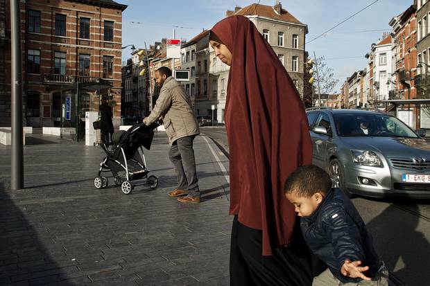 Life is gradually improving in Cureghem, a multi-ethnic district in Brussels, but the same cannot be said of disaffected, radicalized Molenbeek across the canal.
