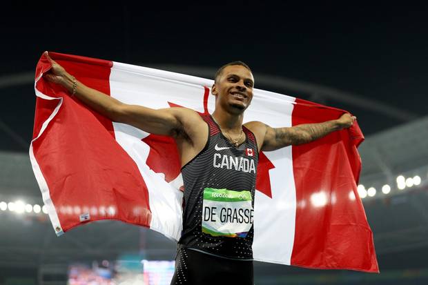 Andre De Grasse of Canada celebrates placing third after the Men's 100 meter final on Day 9 of the Rio 2016 Olympic Games at the Olympic Stadium on August 14, 2016 in Rio de Janeiro, Brazil.