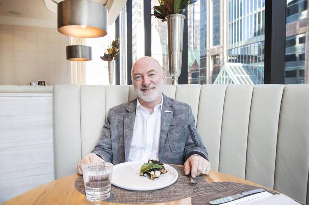 Tony Cobb, owner of Fogo Island Fish, poses with a dish made from his product: wild, hand-lined North Atlantic Cod, at the at the The Chase Fish and Oyster restaurant in Toronto, Friday November 24, 2017.