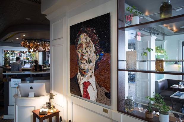 Glass artwork of Prime Minister Justin Trudeau at La Pentola.