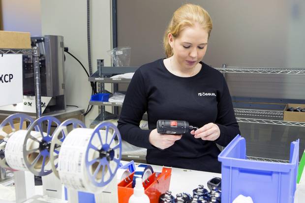 A woman works in the assembly department of Ossur, an international company that makes prosthetics, on Dec. 6, 2017 in Reykjavik, Iceland. Ossur is certified as a company that has equal pay as part of a gender equality requirement recently passed by the government.
