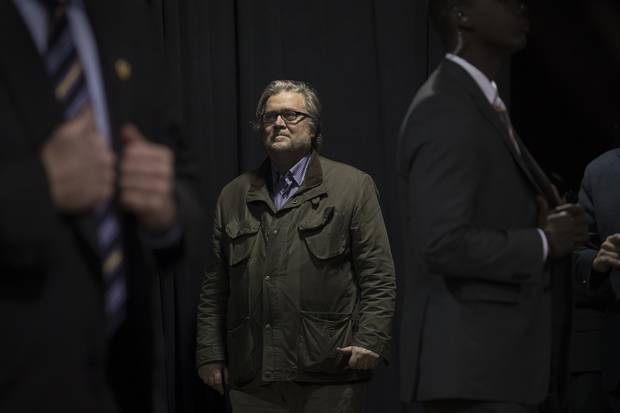 Steve Bannon looks on during a campaign speech from Donald Trump in New Hampshire.