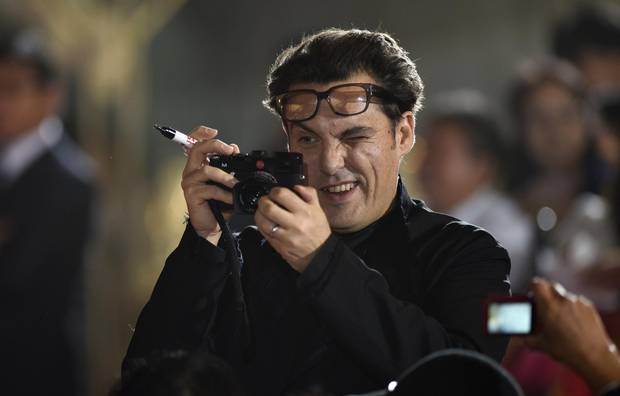 British director Joe Wright takes pictures of fans during the Japanese premiere of his movie Pan in Tokyo in 2015. The filmmaker is probably best known for his costume dramas with literary credentials.