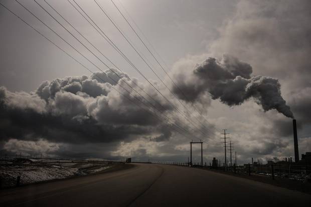 Highway 63 curves past the Syncrude oil sands site, north of Fort McMurray. 