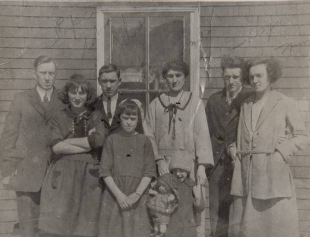 One of Mrs. Chapman’s family photos shows her mother, back row centre, father, back row left, and siblings taken a few years after the explosion. Mrs. Chapman is second from left in the front row.