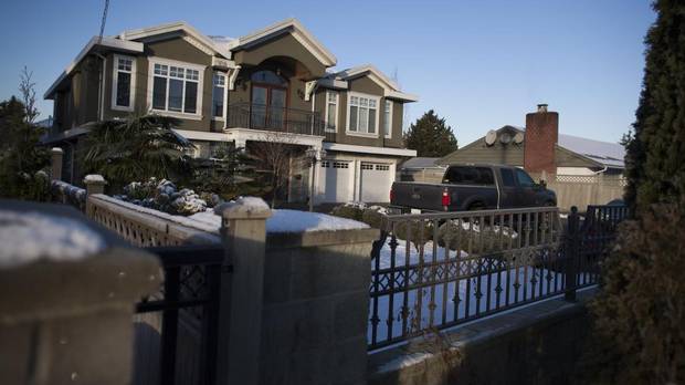 A house located at 8691 Garden City Rd. in Richmond, B.C.