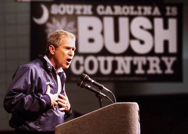 Republican presidential hopeful Texas Governor George W. Bush addresses the crowd during a community barbecue at the Florence Civic Center in Florence, South Carolina ahead of the primary in that state in 2000.