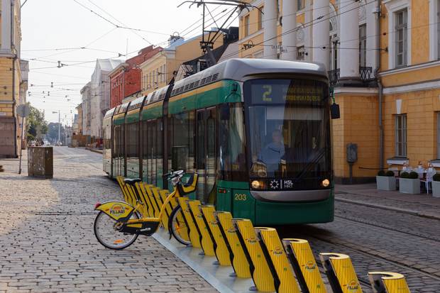 A tram in Helsinki’s city centre. Helsinki’s integrated transit plan aims to make private auto use unnecessary in the city centre by 2025.