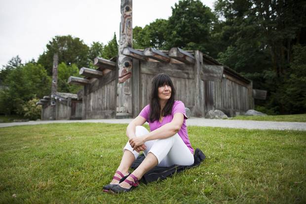 Nika Collison sits in front of the Haida Longhouse at the UBC Museum of Anthropology in Vancouver. As co-chair of the Haida Repatriation Committee, she brokered the deal that brought the mountain goat moon chest to the Haida Gwaii Museum.
