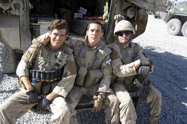 Mr. Kennedy (centre) at patrol base Sperwan Ghar in Kandahar, Afghanistan, in September, 2010. He is with members of Charles Company, 1st Battalion, Royal Canadian Regiment.