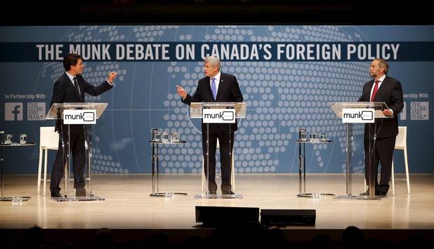 Liberal Leader Justin Trudeau, Conservative Leader Stephen Harper, and New Democratic Party Leader Thomas Mulcair take part in the Munk leaders' debate on Canada's foreign policy in Toronto on Sept. 28, 2015.