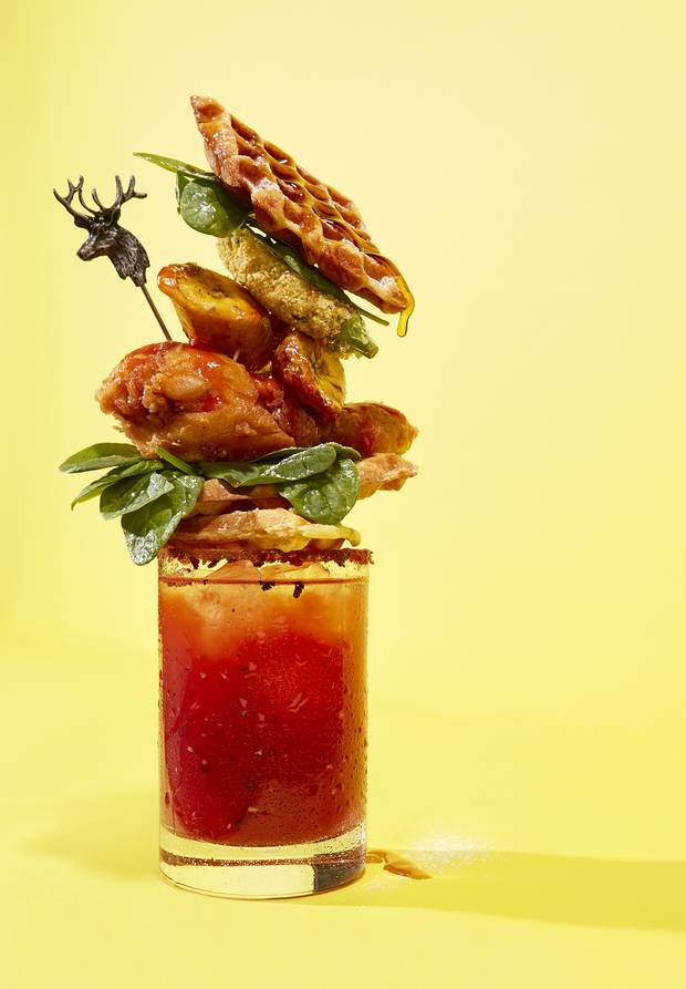 GARNISH OPTION #2: The Bloody Jerk (Harlem, Toronto). Celery salt, cayenne and jerk spice for rim; 1 piece fried chicken; deep fried pickles; deep-fried okra; candied plantain; waffle; cherry tomato; house maple syrup (on the side); hot sauce (on the side).