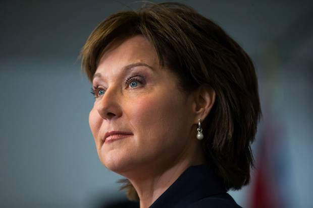 B.C. Premier Christy Clark addresses reporters in Vancouver on Tuesday, May 30.
