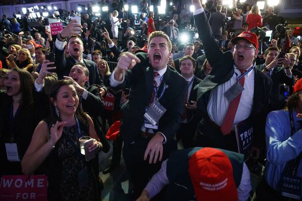 Nov. 8, 2016: Supporters of then Republican presidential candidate Donald Trump cheer as they watch election returns in New York.
