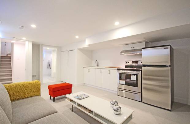 The basement suite features three above-grade windows.