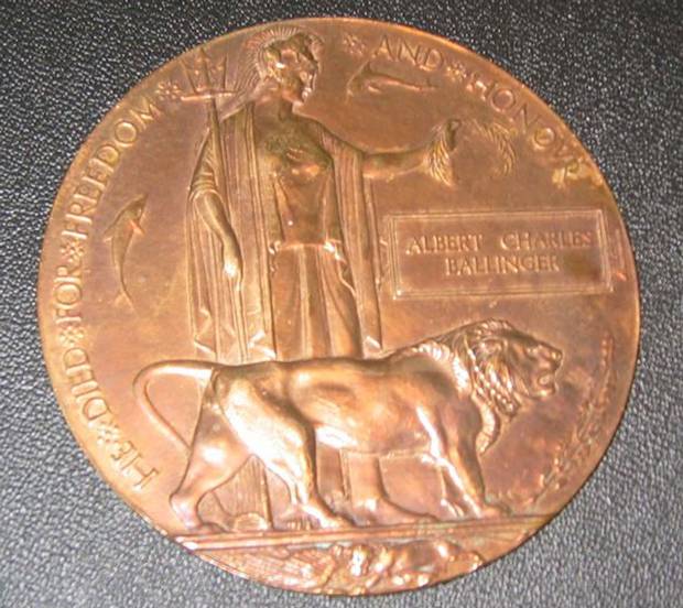 A memorial plaque, commonly known as a “death penny,” honours Private Albert Charles Ballinger, who was killed in the Battle of Hill 70 in 1917.