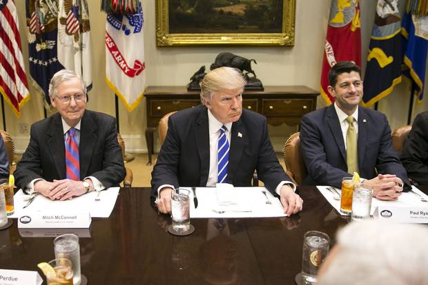 President Donald Trump meets with Republican lawmakers including Majority Leader Mitch McConnell, second left, over lunch at the White House in Washington on March 1, 2017.