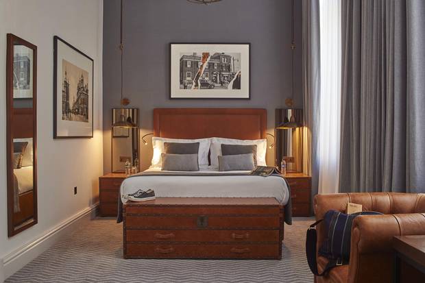 Local architects 3D Reid renovated the sweeping Edwarding structure with designers Michaelis Boyd, amping up the industrial references with iron-mullion mirrors and steel lighting in the hotel's rooms.