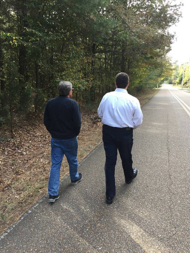 Steve Stone and Bashar Shala walk along the side of the Friendship Park they are planning.