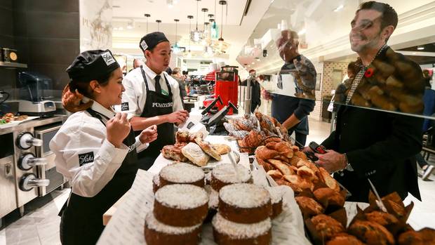 Gourmet food boutique Pusateri’s is looking to reinvent the traditional food hall. The company opened a location in Saks Fifth Avenue’s Food Hall in the Eaton Centre on Thursday, serving everything from charcuterie to dessert. 