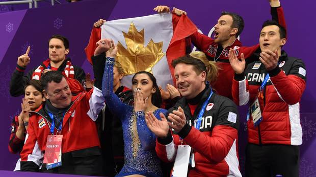 Canada's Gabrielle Daleman (front C) reacts after competing in the figure skating team event women's single skating free skating during the Pyeongchang 2018 Winter Olympic Games at the Gangneung Ice Arena in Gangneung on February 12, 2018.