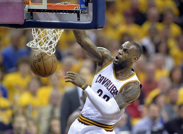 Cleveland Cavaliers forward LeBron James (23) dunks in the second quarter against the Toronto Raptors.