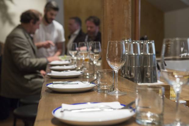 Place settings along the bar at Ten Foot Henry.