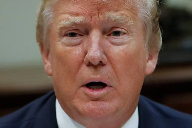 Donald Trump is shown in the Roosevelt Room of the White House in this July 18 file photo.