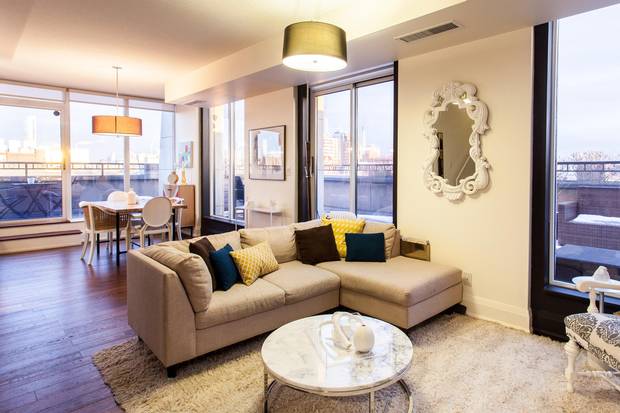 The unit has two floors and a wrap-around terrace.