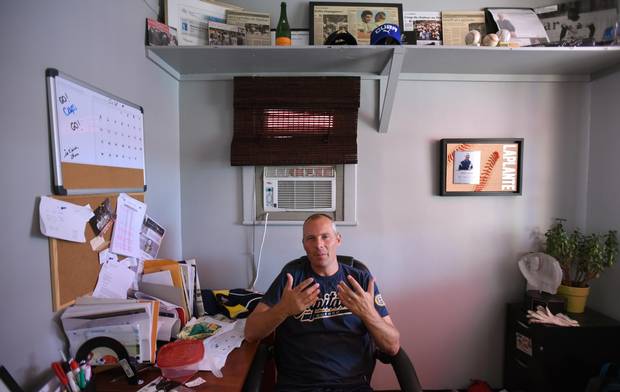 Michel Laplante, president of the Quebec Capitales, is pictured in his office at the Stade Municipal in Quebec City. Four Cuban baseball players were legally allowed to leave the country to play baseball in Canada for the Quebec Capitales. This is a new venture for Cuba which is now only beginning to see a thaw in it's relationship with the United States.